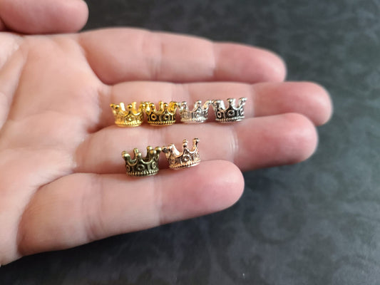 Miniature micro crowns for display and sphere stands in multiple color options. 