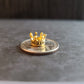 Miniature micro crowns for display and sphere stands in multiple color options. 