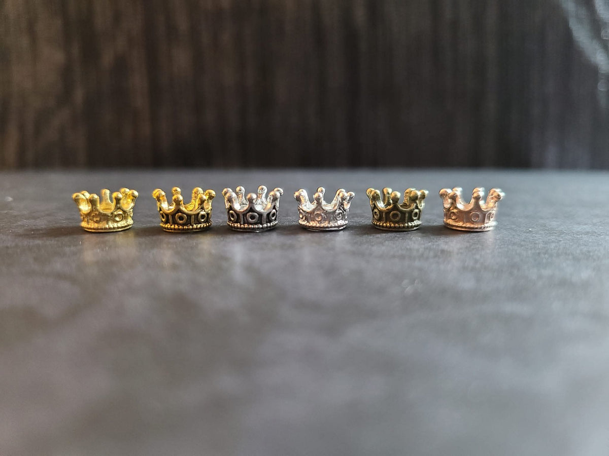Miniature micro crowns for display and sphere stands in multiple color options. 