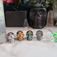 Aura crystal mini skull | 1 (one) 1" aura or titanium coated crystal skull, perfect for those that work with spirits!