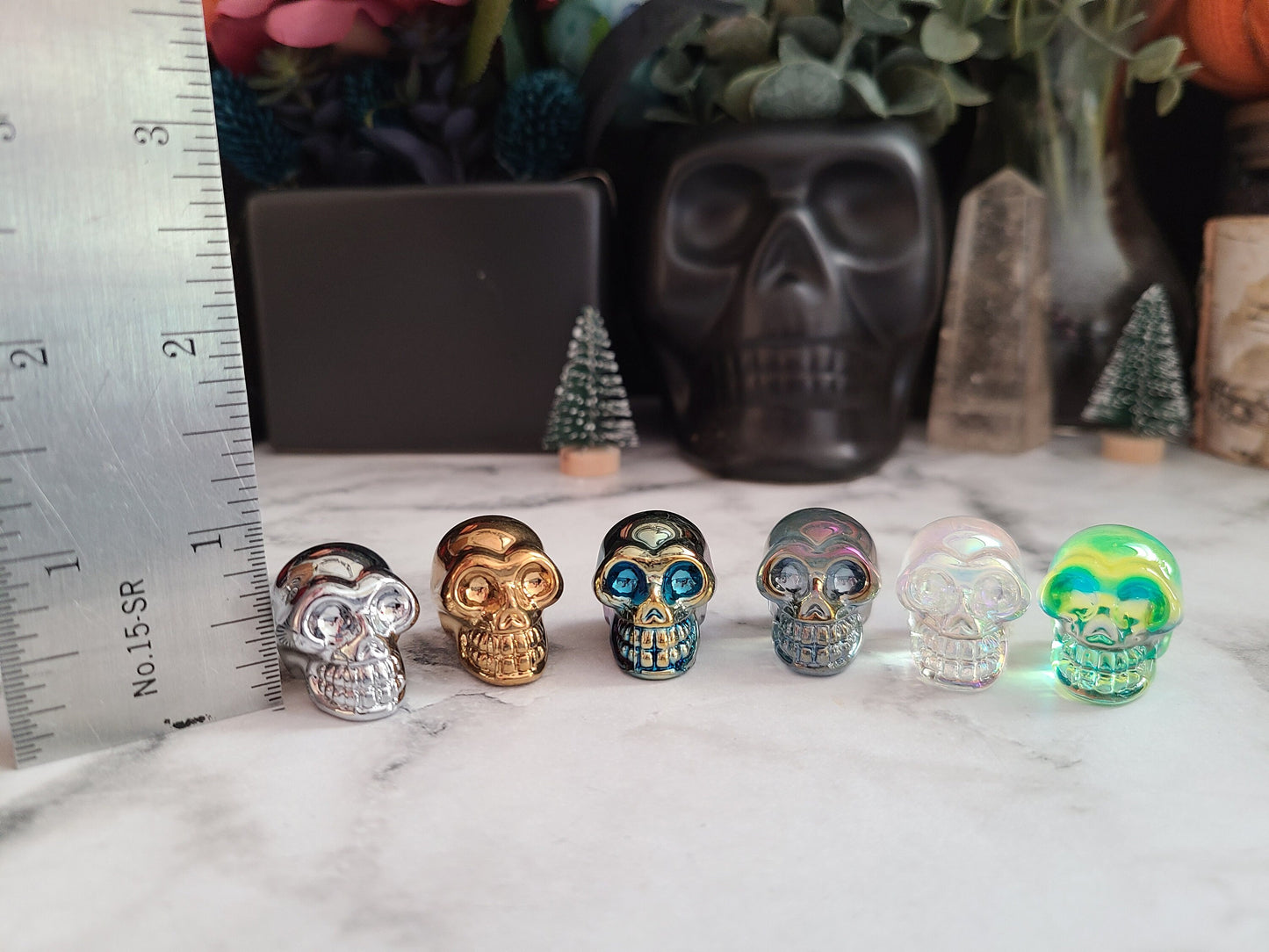 Aura crystal mini skull | 1 (one) 1" aura or titanium coated crystal skull, perfect for those that work with spirits!