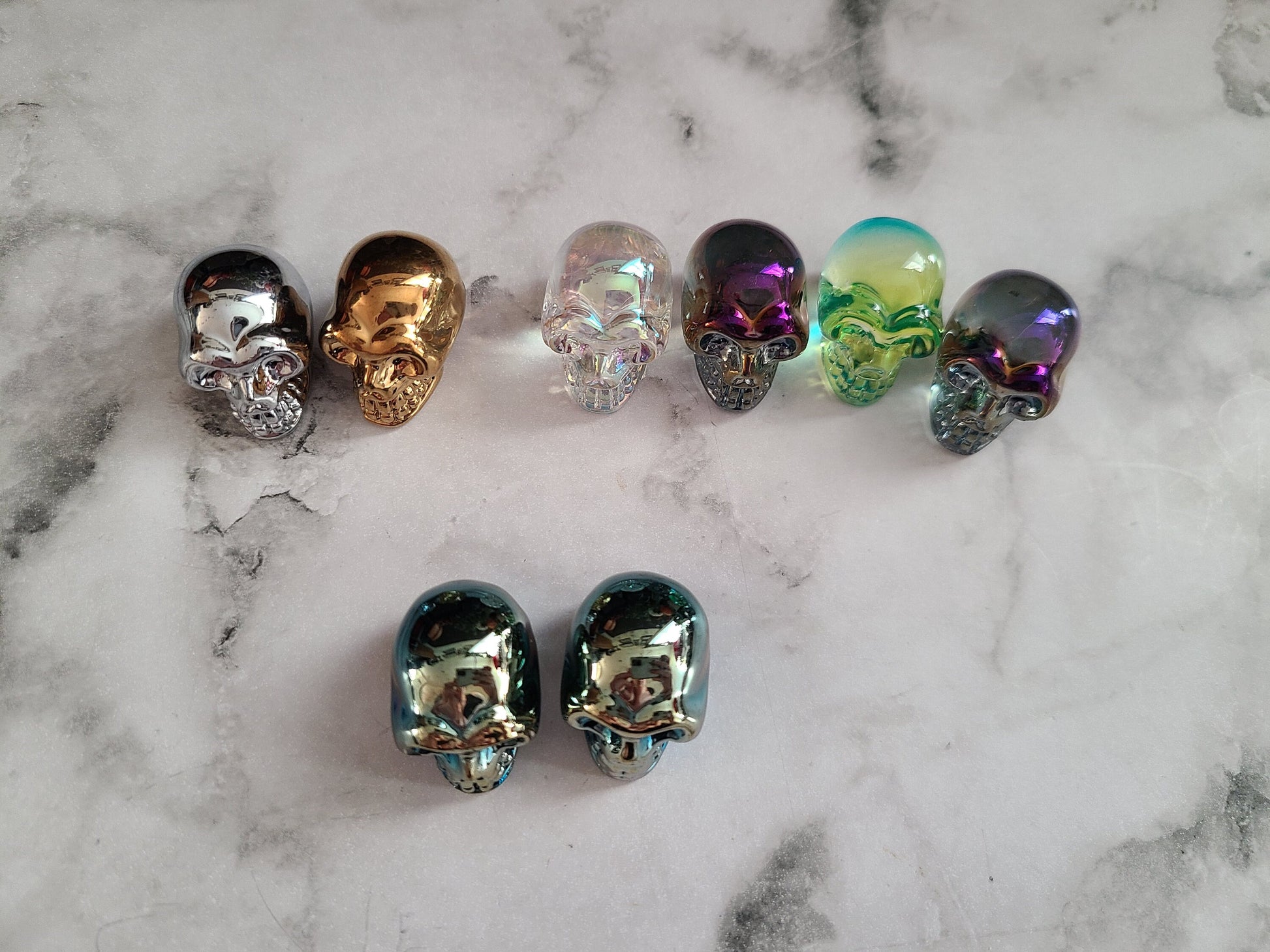 Aura crystal mini skull | 1 (one) 1" aura or titanium coated crystal skull, perfect for those that work with spirits!