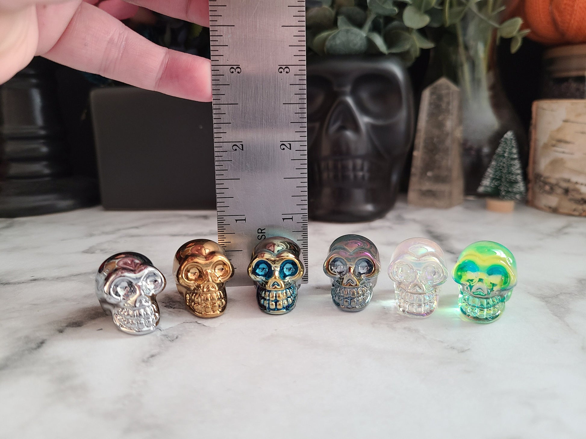 Aura crystal mini skull | 1 (one) 1" aura or titanium coated crystal skull, perfect for those that work with spirits!